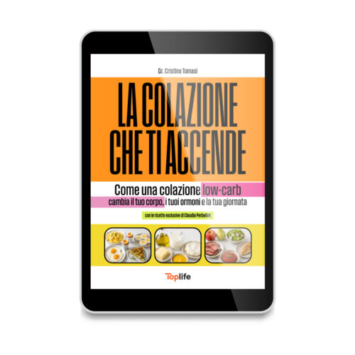 Tablet displaying a colorful cookbook cover about low-carb breakfast recipes, with a large black title on an orange background and smaller subtitle text.