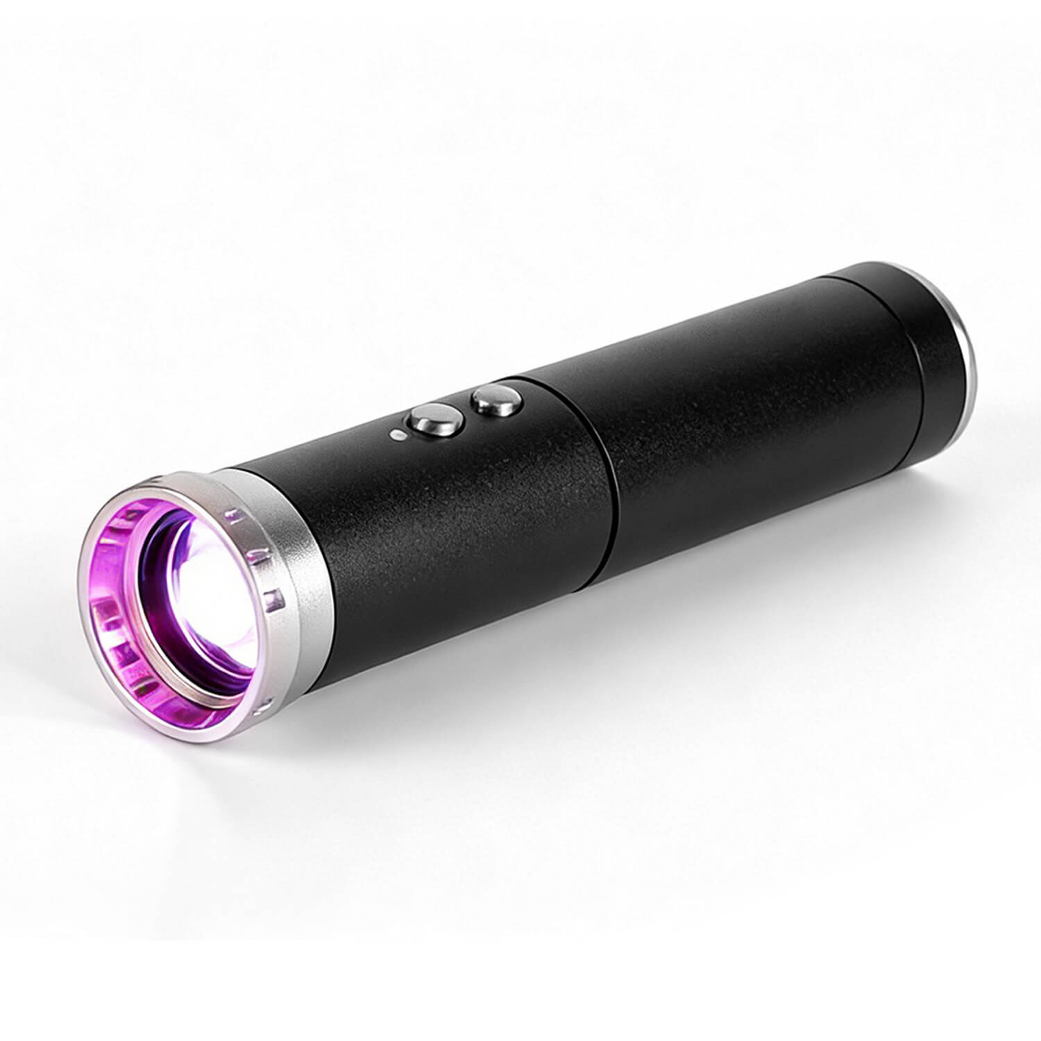 Black handheld flashlight with a purple-tinted lens resting on a white surface