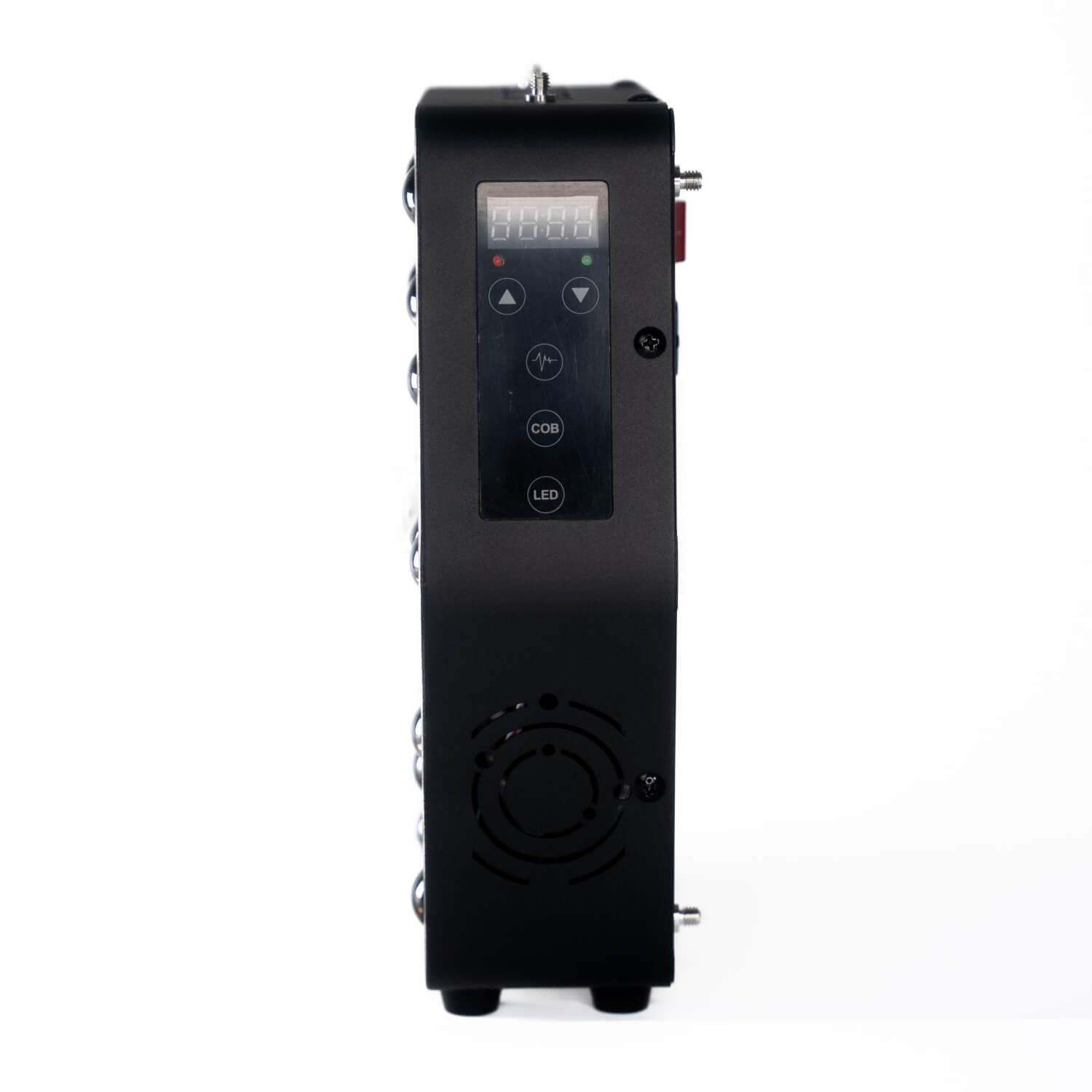 Tall black control unit standing upright with a small digital display and round buttons on the front panel; a cooling fan is visible toward the bottom.