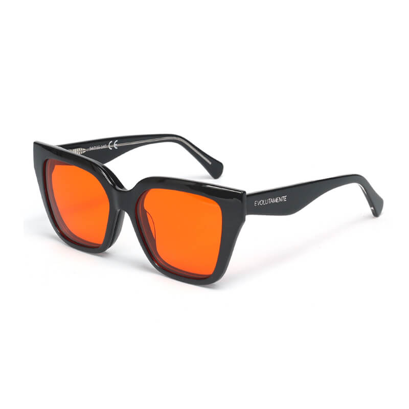 new_rossi_rainbow_mariposa_occhiali_blue_blocker_red-therap Black square-frame sunglasses with orange lenses; EVOLUTAMENTE logo on the temple.