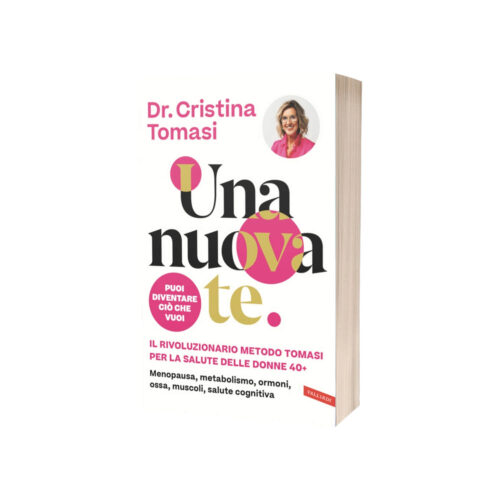 Book cover: 'Una nuova te' by Dr. Cristina Tomasi, with pink and gold circular accents and a small author photo.